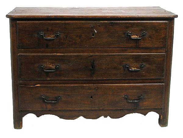 Appraisal: A French Provincial carved oak commode cabinet height in width