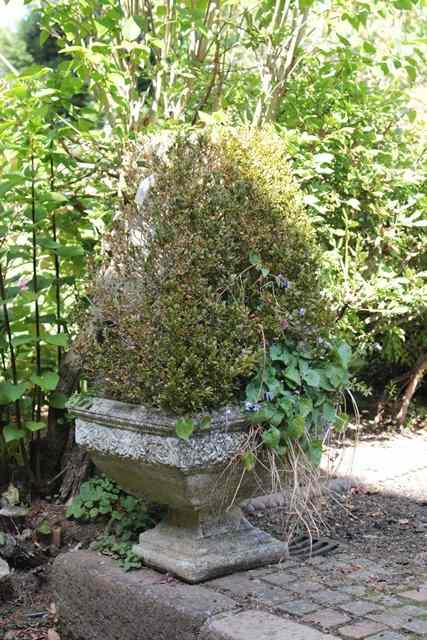 Appraisal: A PAIR OF RECONSTITUTED STONE SQUARE PLANTERS with a band