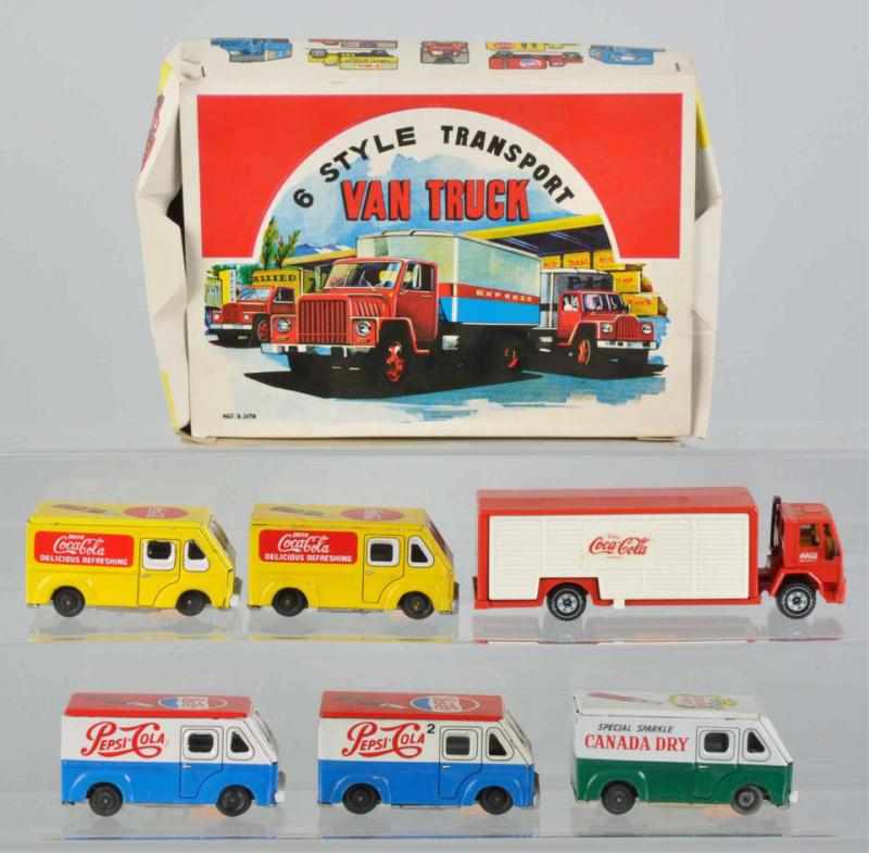 Appraisal: Lot of Soda Related Toy Trucks Description Includes one German