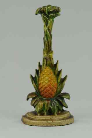 Appraisal: PINEAPPLE DOORSTOP Book Example unique presentation of golden pineapple surrounded