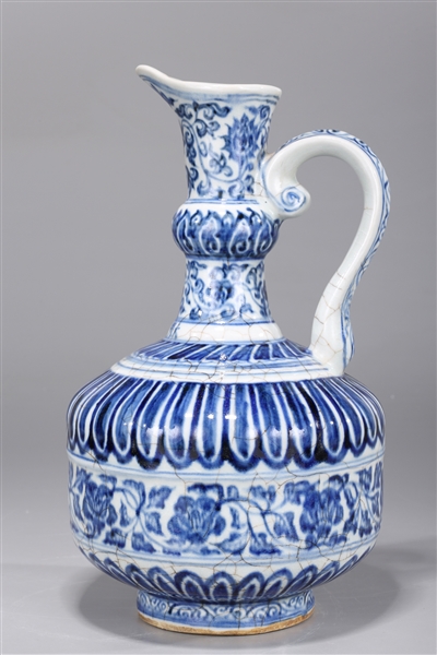 Appraisal: Unusual form Chinese blue and white porcelain ewer with repeating