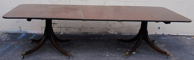 Appraisal: Mahogany banquet table th c with a double pedestal base