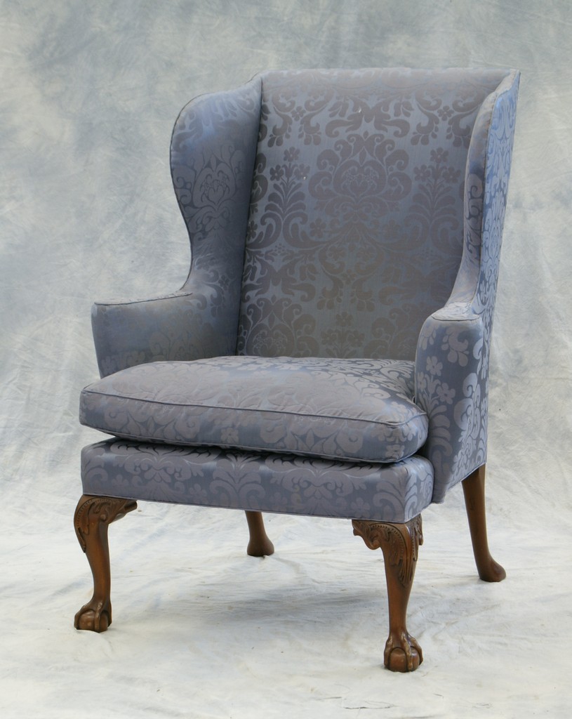 Appraisal: Chippendale style wing chair in blue upholstery by Kittinger h