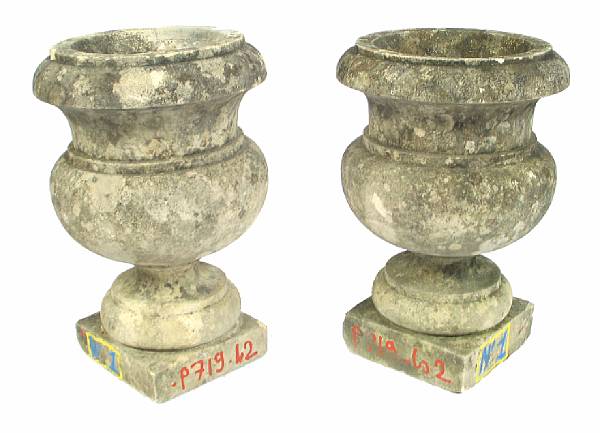 Appraisal: A pair of concrete urns height in diameter in