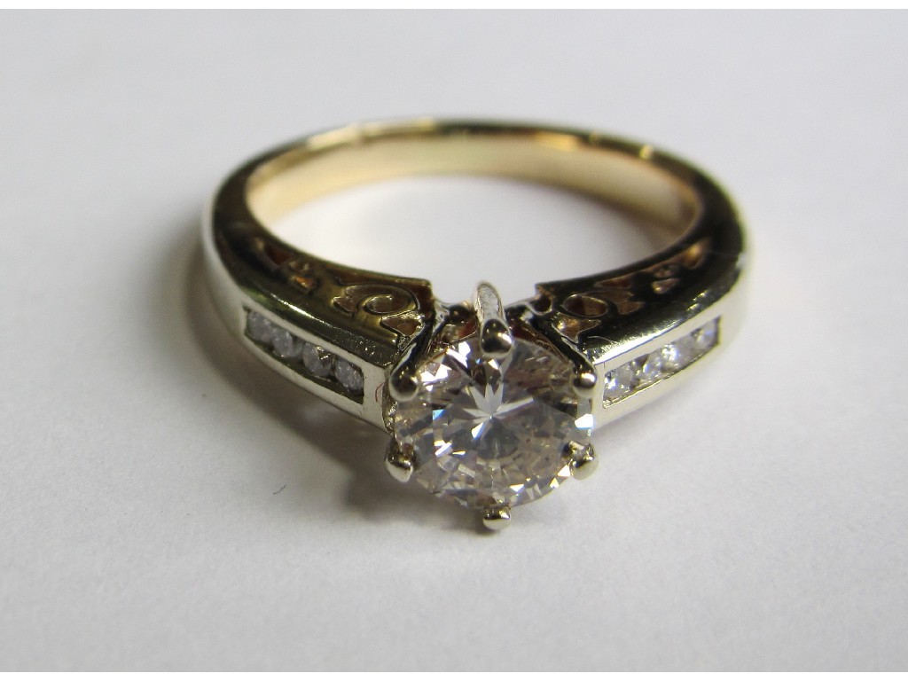 Appraisal: A fourteen carat gold diamond solitaire ring with brilliant cut