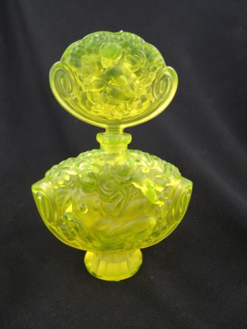 Appraisal: Czechoslovakia Art Glass Perfume Bottle vaseline nudes and cherubs frosted