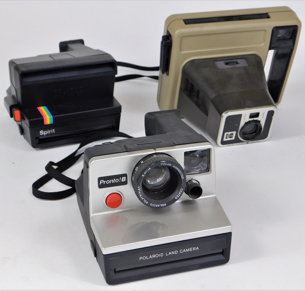 Appraisal: GROUP OF INSTANT CAMERAS Group of instant cameras Including Polaroid