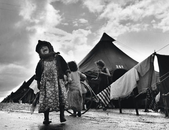 Appraisal: CAPA ROBERT - Refugee Child Crying Refugee Girl on Bags