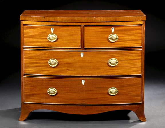 Appraisal: Regency Mahogany Bowfront Chest early th century the banded and