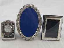 Appraisal: A silver faced boudoir clock x cm and two modern