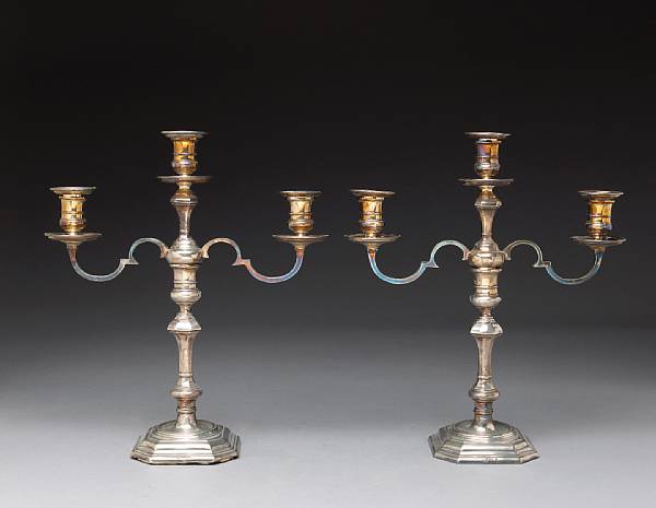 Appraisal: An Elizabeth II silver pair of weighted candlesticks with three