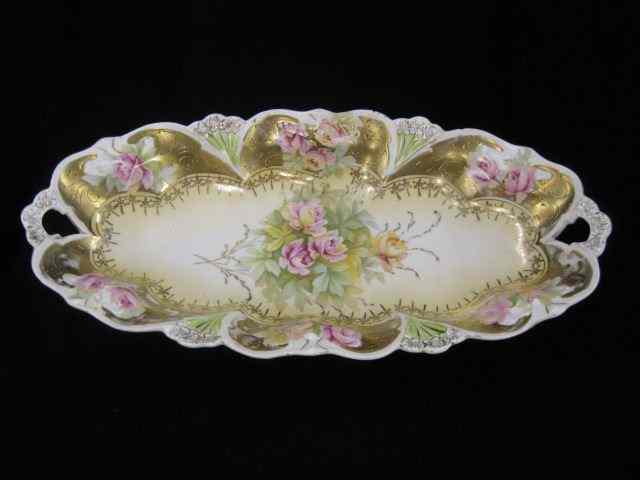 Appraisal: R S Germany Porcelain Celery Dish floral with extensive goldwork