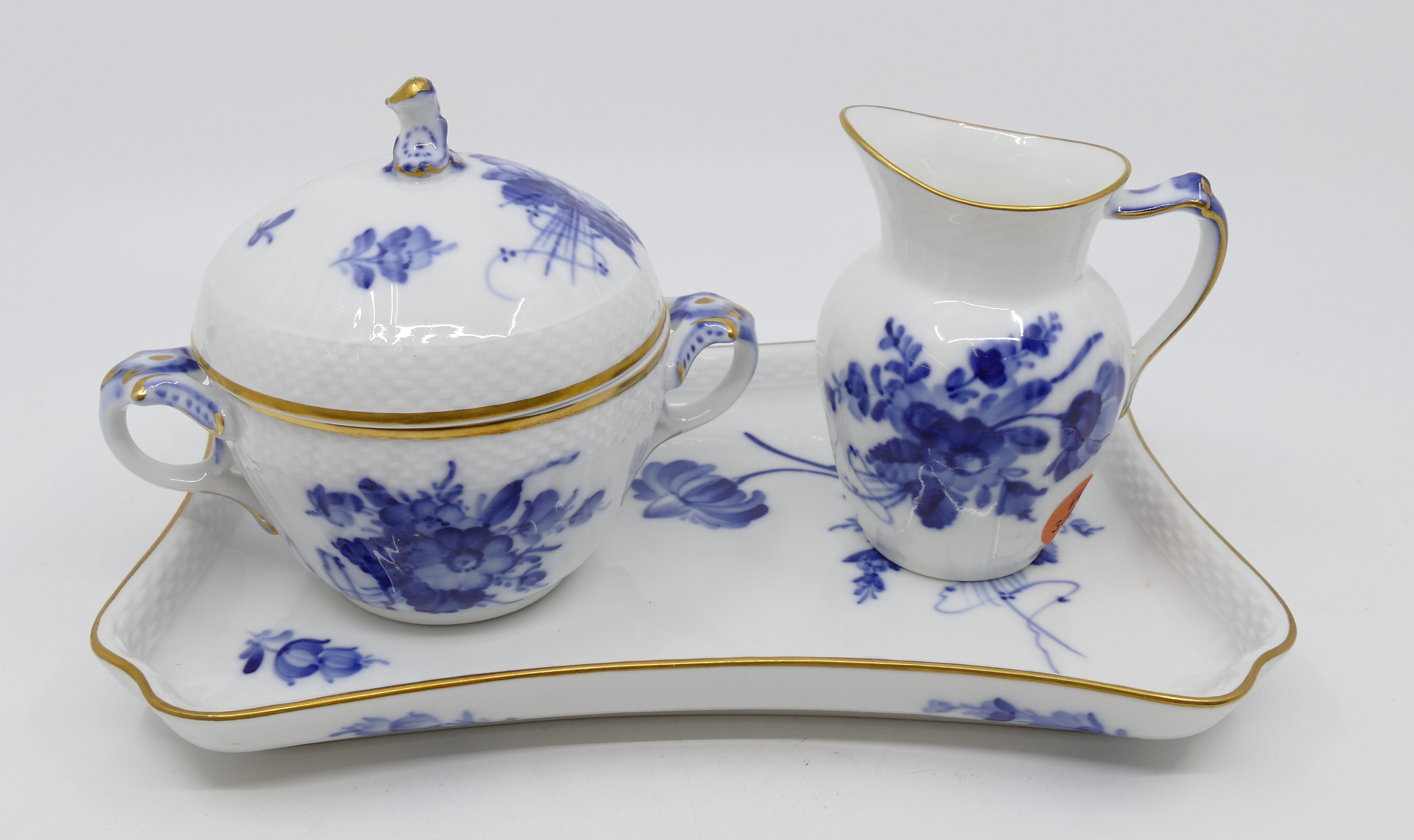 Appraisal: pc Set Royal Copenhagen Blue Flowers Curved Sugar Creamer and