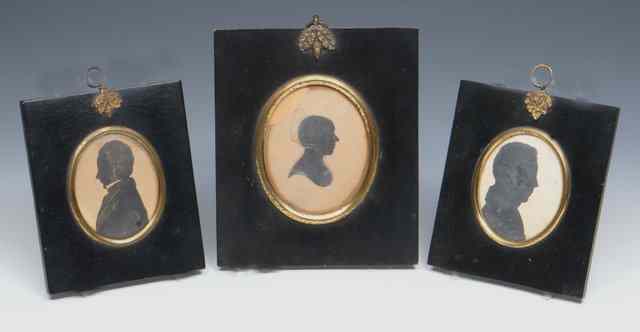 Appraisal: THREE ANTIQUE SILHOUETTE PORTRAITS in ebonised frames the largest x