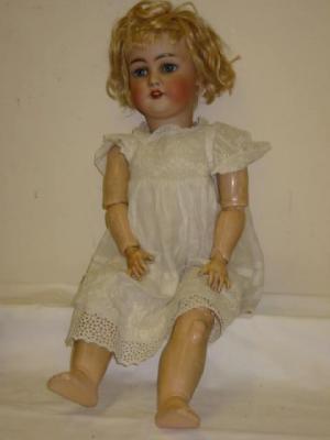 Appraisal: A Simon Halbig bisque head girl doll with blue glass