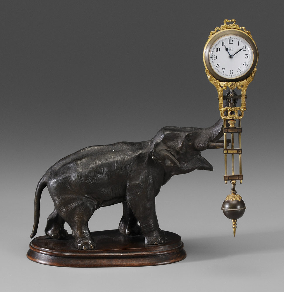 Appraisal: Elephant Swinger Clock German th century patinated brass elephant mounted