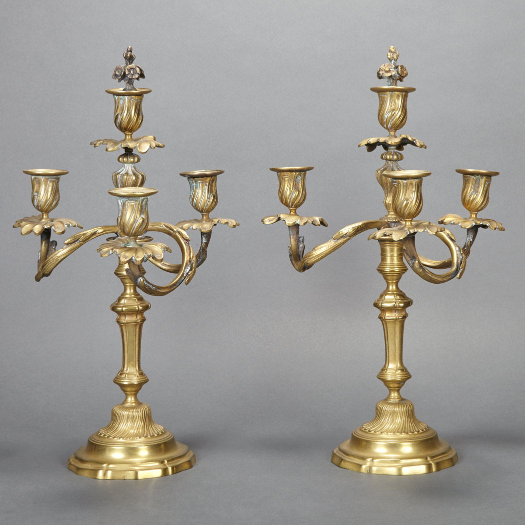 Appraisal: Pair of Louis XV Style Gilt-Metal Four-Light Reversible Candelabra Each