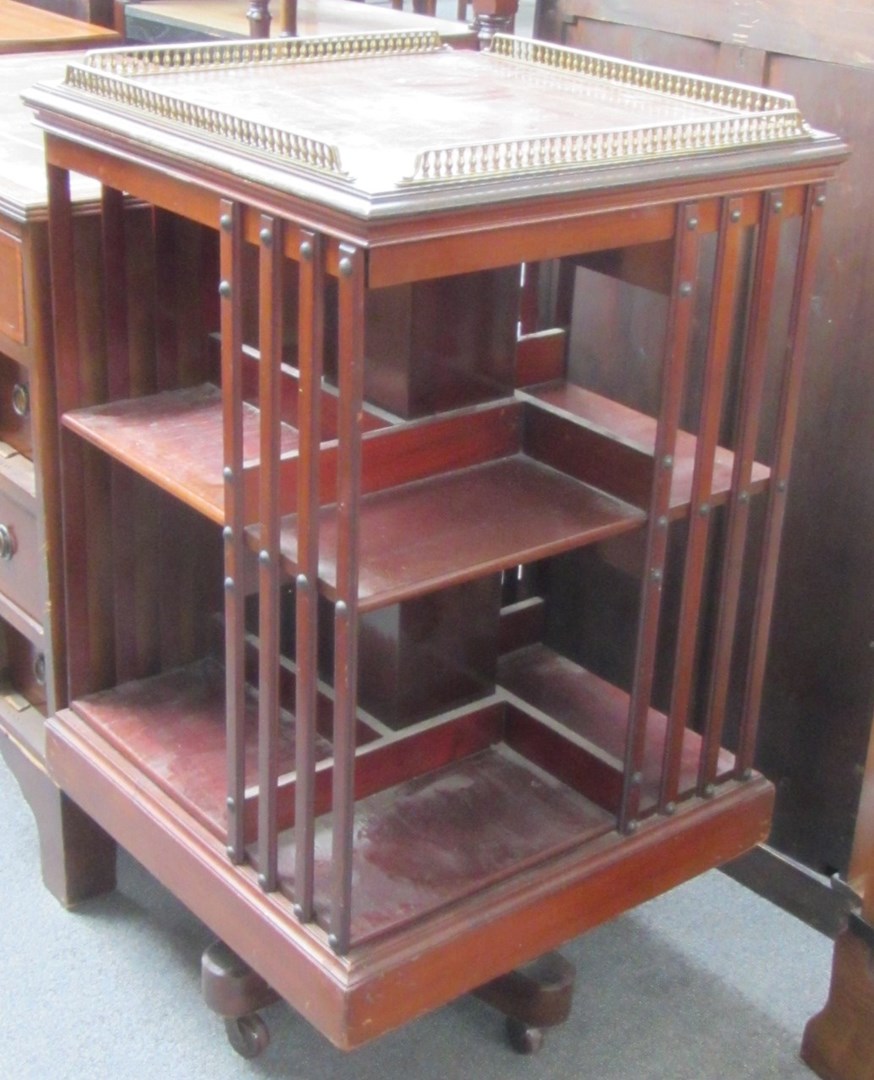 Appraisal: A th century brass mounted mahogany square revolving bookcase cm