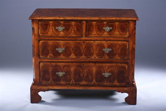 Appraisal: GEORGE I STYLE OYSTER-VENEERED WALNUT CHEST th Century Rectangular molded-edge