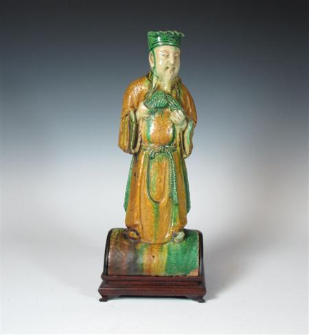 Appraisal: A Chinese Ming roof tile decorated in green and ochre