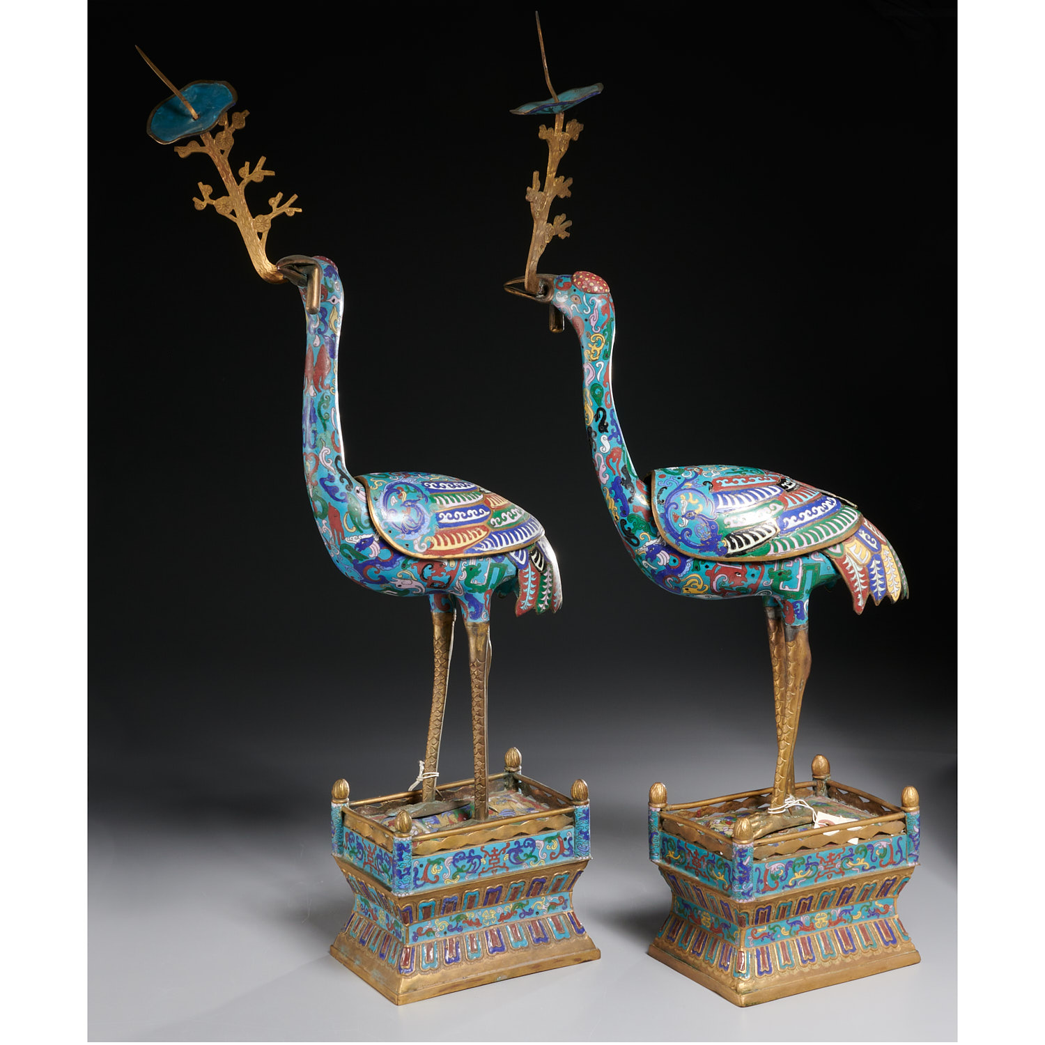 Appraisal: PAIR CHINESE CLOISONNE CRANE PRICKETS th c gilt and polychrome