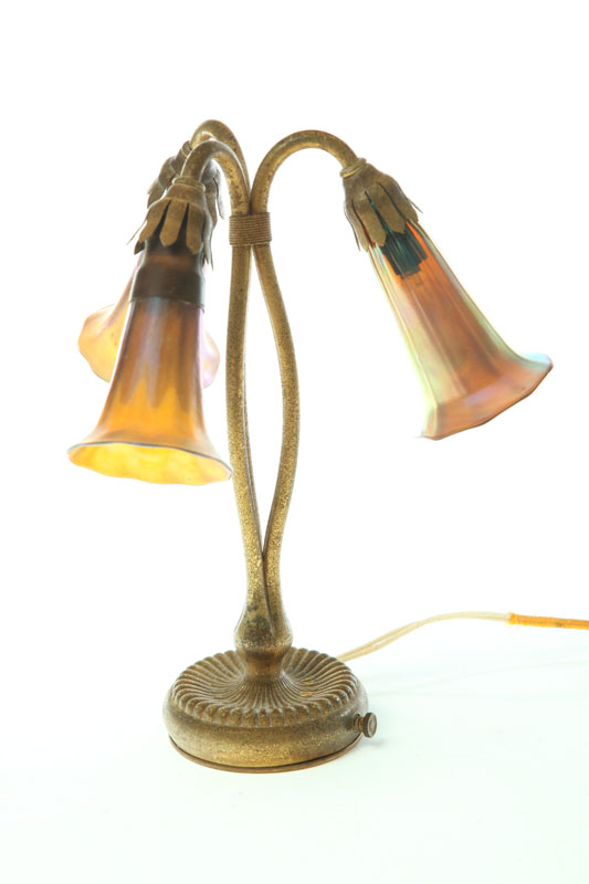 Appraisal: TIFFANY LAMP New York early th century Three-light lily lamp