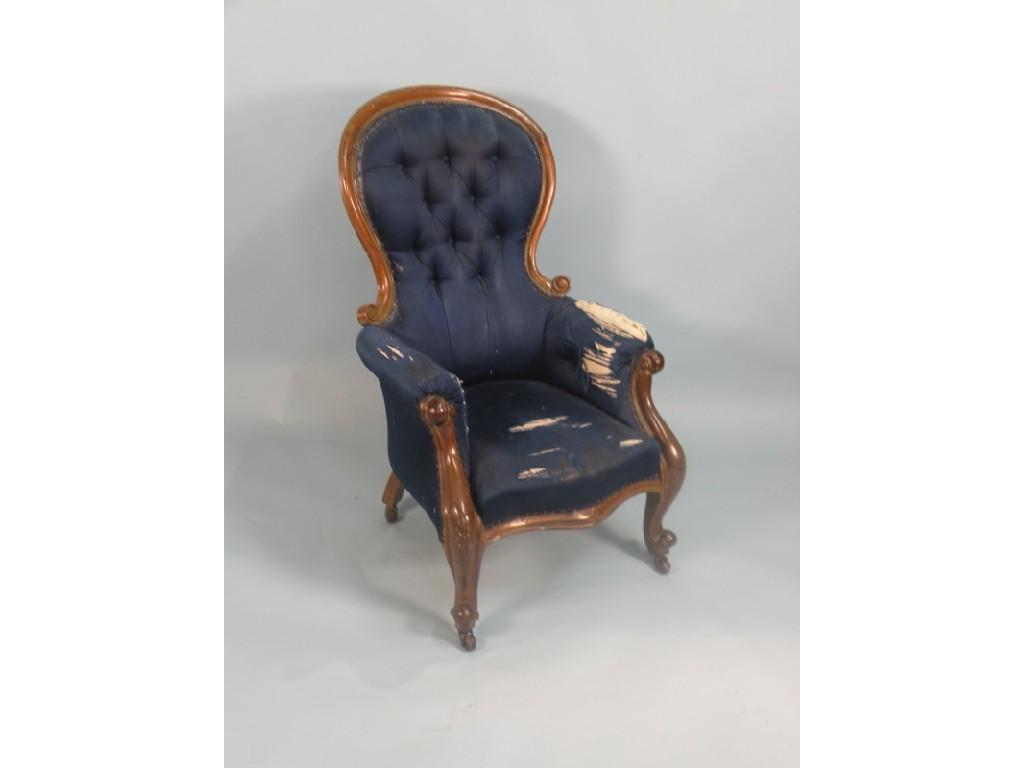 Appraisal: A Victorian mahogany spoon back chair upholstered in navy blue