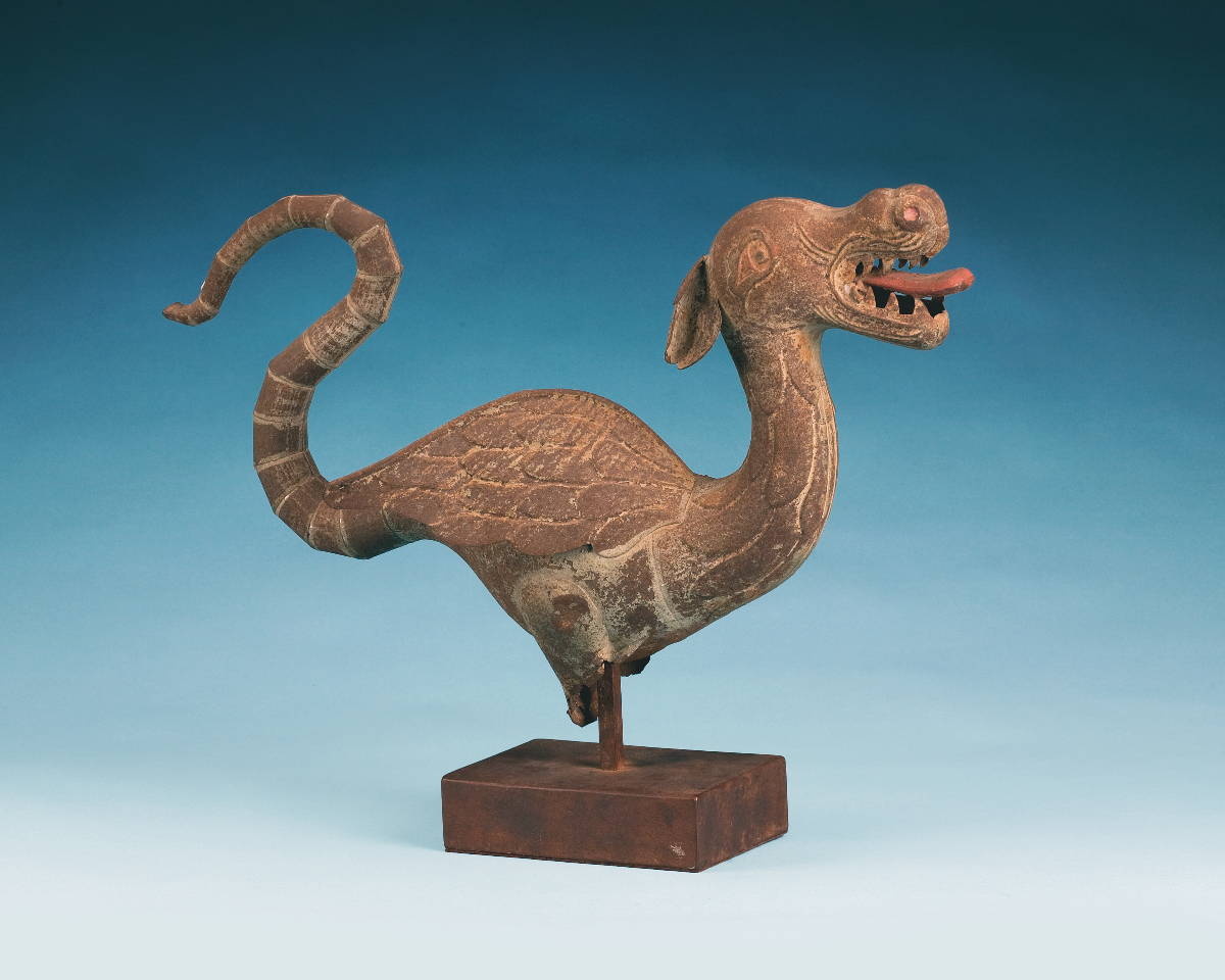 Appraisal: CONTINENTAL PATINATED-METAL FIGURE OF A DRAGON IN THE CHINOISERIE STYLE