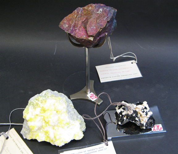 Appraisal: THREE NATURAL STONE FORMATIONS a specimen of sulphur crystals on