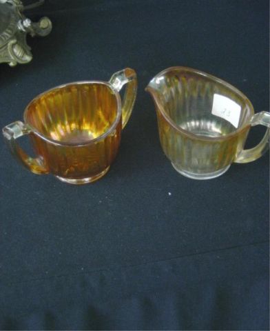 Appraisal: CARNIVAL GLASS CUP SUGAR