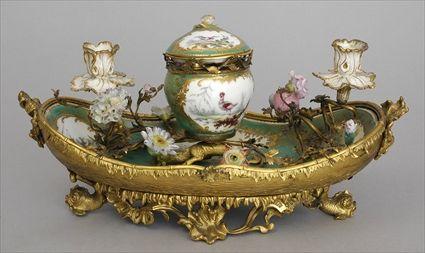 Appraisal: LOUIS XV-STYLE GILT-BRONZE MOUNTED S VRES ENCRIER The boat-form stand