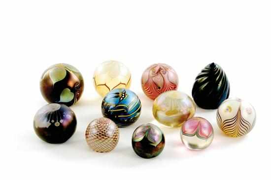 Appraisal: Iridescent art glass paperweight collection circa - various shapes and