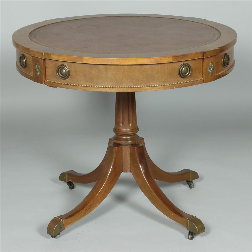 Appraisal: REGENCY STYLE MAHOGANY AND LEATHER DRUM OR RENT TABLE having