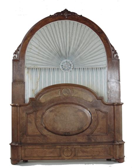 Appraisal: A Victorian walnut high back bed the arched head board