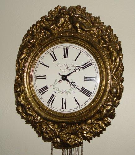 Appraisal: DECORATIVE FRENCH STYLE WAG ON THE WALL CLOCK Decorative example