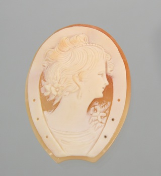 Appraisal: An Unmounted Carved Shell Cameo A carved shell cameo depicting