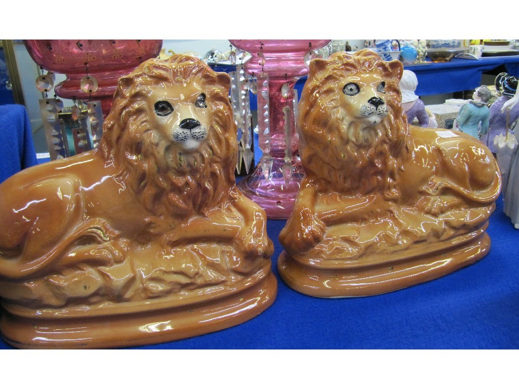 Appraisal: Pair of Staffordshire wally lions