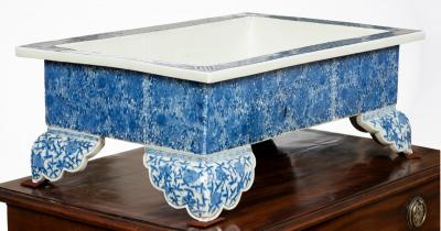 Appraisal: A Japanese blue and white jardiniere of rectangular form on