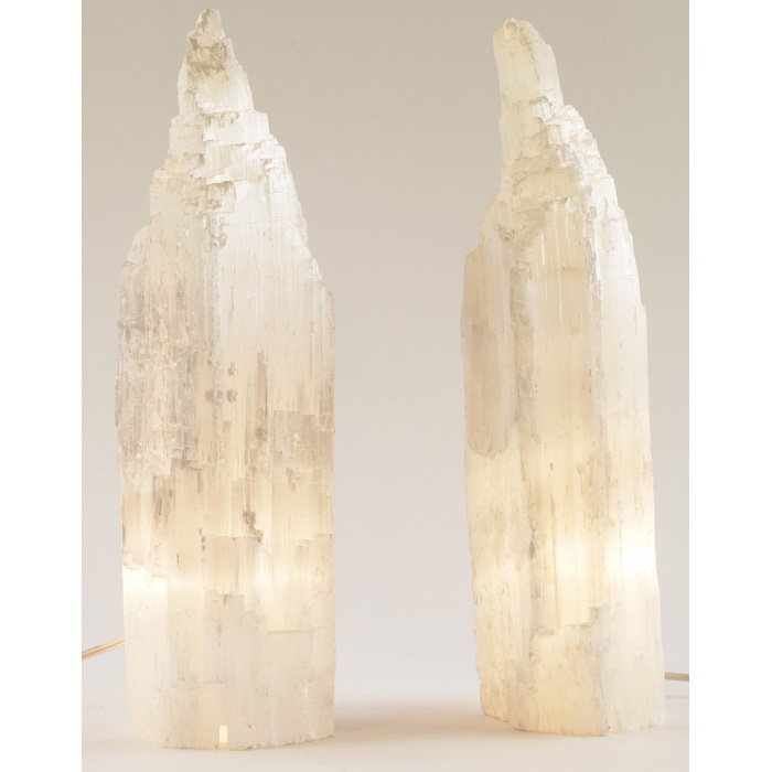 Appraisal: Rock crystal table lamps two quartz irregular surfaces internally lit