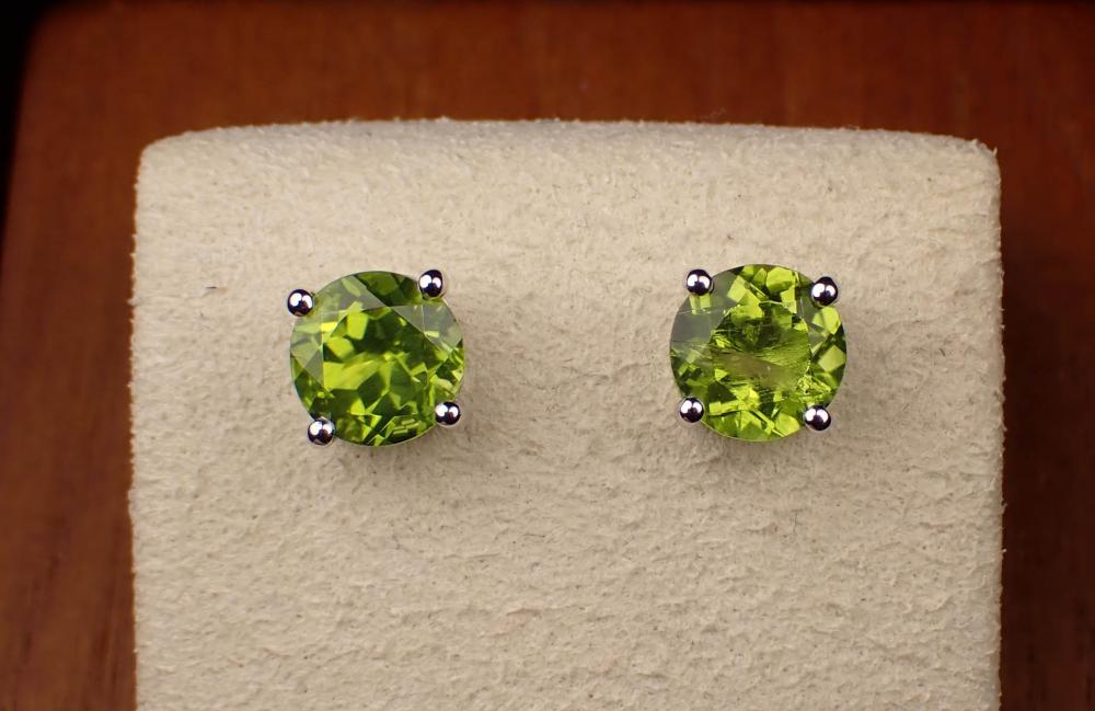 Appraisal: PAIR OF PERIDOT AND FOURTEEN KARAT GOLD EAR STUDS each