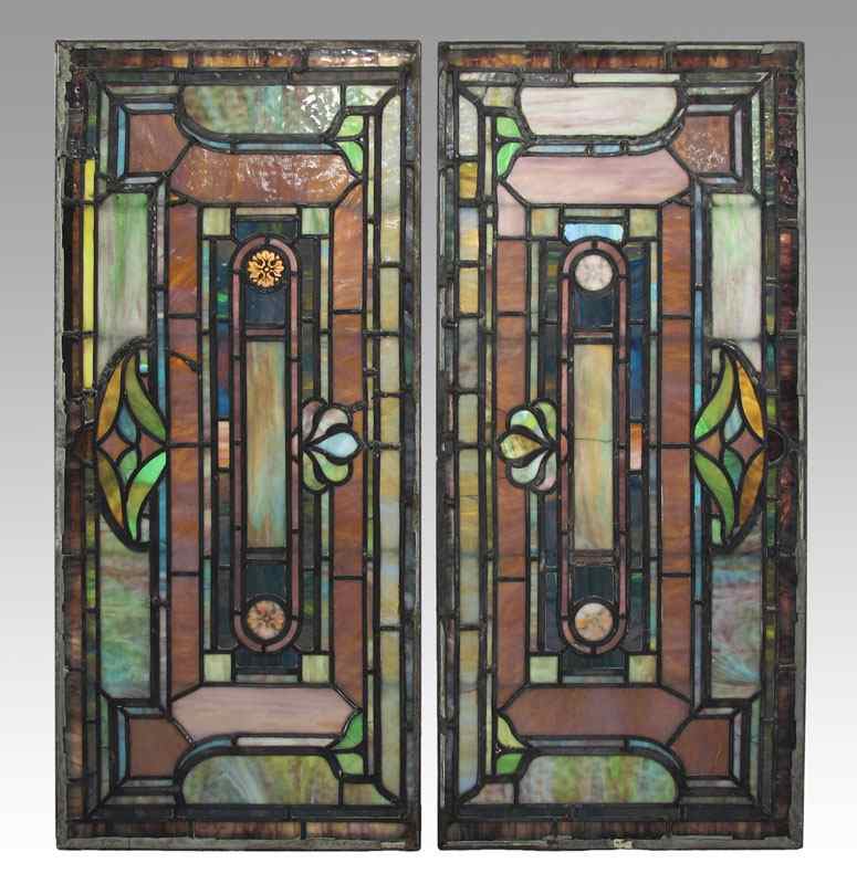 Appraisal: PAIR OF ARCHITECTURAL LEADED STAINED GLASS WINDOWS Salvaged from a