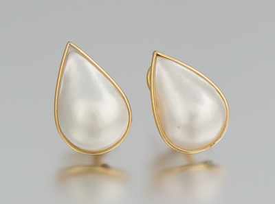 Appraisal: A Pair of Mabe Pearl Earrings k yellow gold earrings