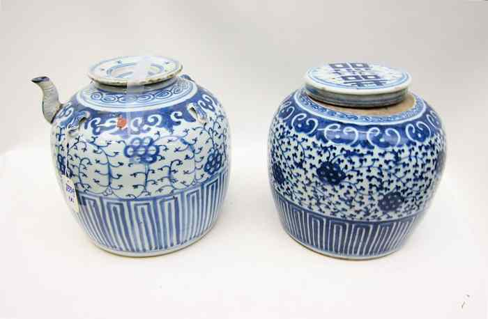 Appraisal: TWO CHINESE BLUE AND WHITE COVERED JARS the first an