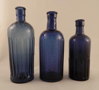 Appraisal: Poison round cobalt bottles Poison- round cobalt all embossed with