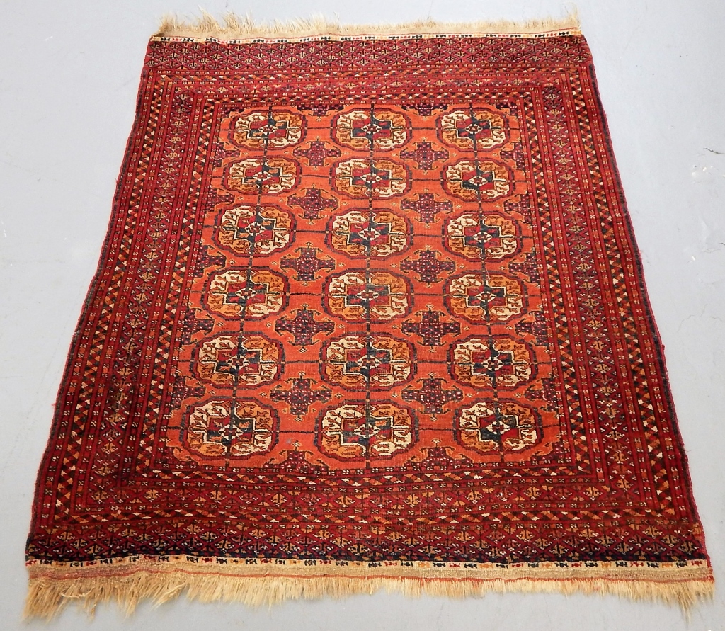 Appraisal: C TURKMEN GEOMETRIC CARPET RUG Persia C Red ground with