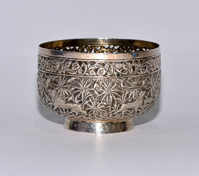 Appraisal: An Indian silver small pedestal bowlthe exterior embossed with storks