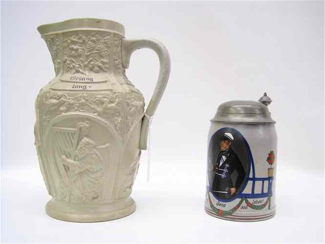 Appraisal: TWO GERMAN BEER COLLECTIBLES a liter stein dated having painted