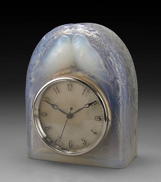 Appraisal: A Ren Lalique molded opalescent glass clock Deux Columbes Marcilhac