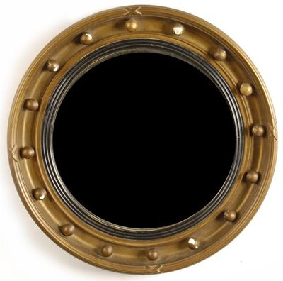 Appraisal: A Regency style convex wall mirror the reeded slip to