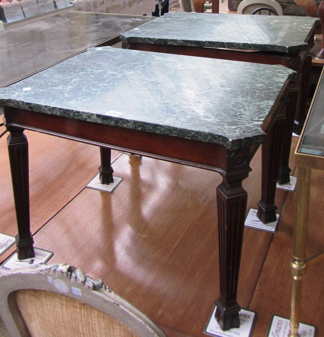 Appraisal: A pair of George III design marble top rectangular low